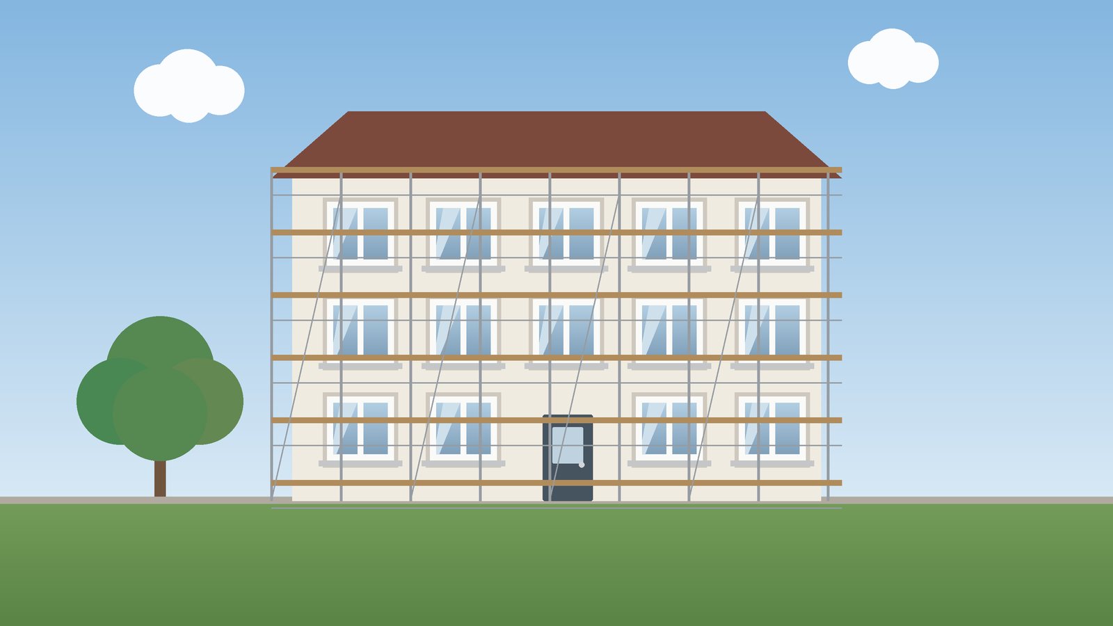 Mehrfamilienhaus mit Gerüst vor der Fassade